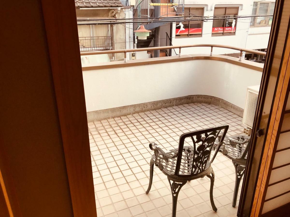 Ropeway St. Guesthouse Matsuyama  Bagian luar foto