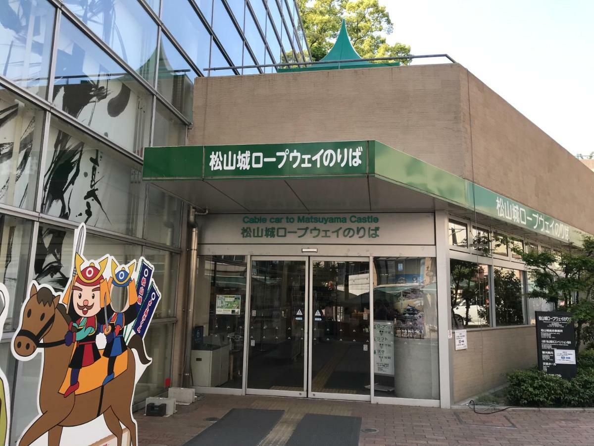 Ropeway St. Guesthouse Matsuyama  Bagian luar foto