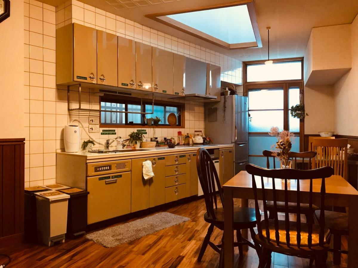 Ropeway St. Guesthouse Matsuyama  Bagian luar foto